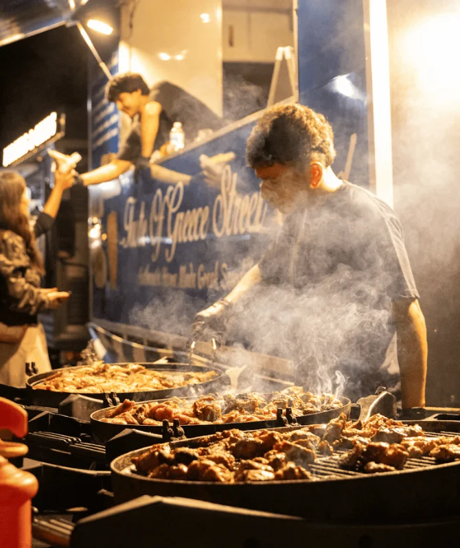 Food traders at an evening market